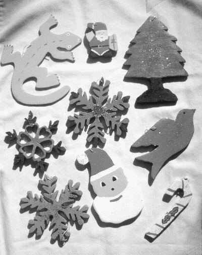 A selection of wooden Christmas ornaments.