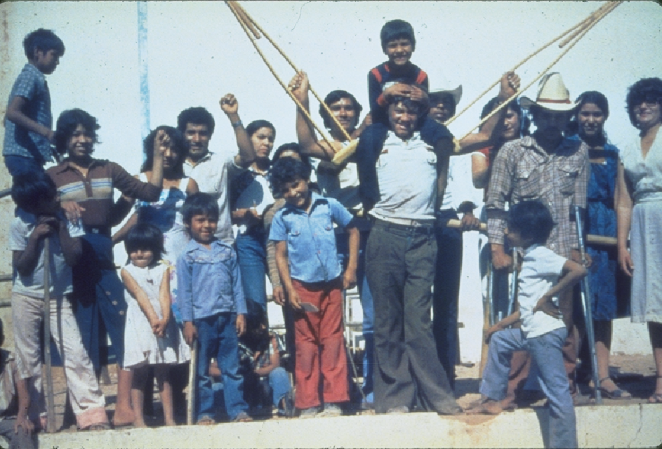 PROJIMO workers and village children present a socio drama (skit) to the village.