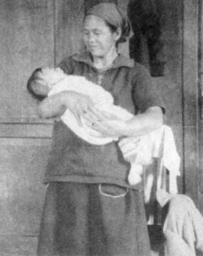A midwife and her grandchild