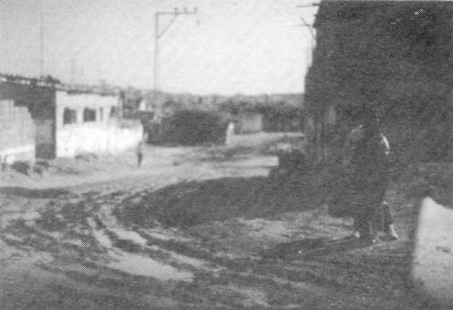 Sewage flows down a street in a refugee camp in Gaza.