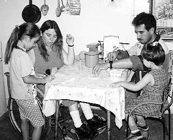 Conchita and Miguel with their two children