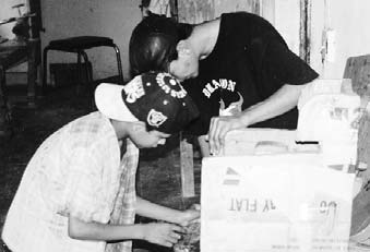 Children in the village helped to build the cardboard seat.