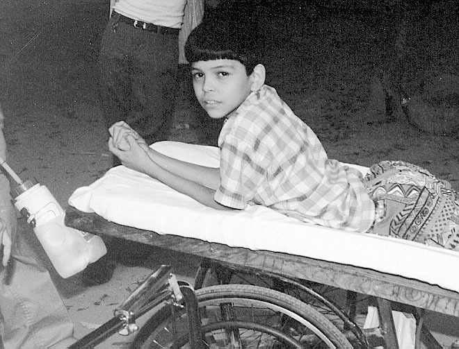 Alejandro shortly after he was shot, age 12.
