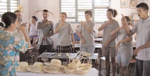 The interpreter and sign language teacher in the sheltered workshop in Bartolome Maso also works with the training program of the CBR Project.