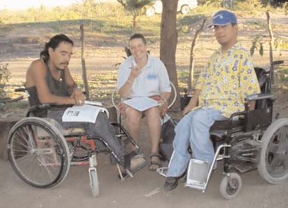 Julio and his apprentice, Gabriel, teach Spanish to a student.