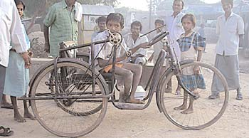 This child’s tricycle is far too heavy and big.