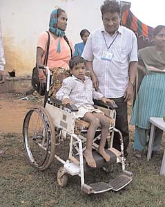 Jayaram sits better in the cardboard insert seat.