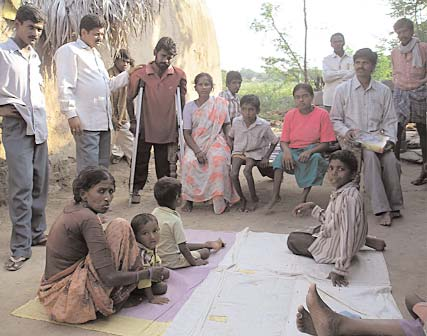 A group of disabled people in this village near Hyderabad was assembled by one of the disabled leaders of the NPdO, standing on the right.