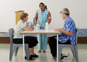 #1. This skit opens in a restaurant where a blind woman (the role is acted by a woman who is actually blind) and a visually impaired woman are sitting at a table trying to read the menu—but can’t.