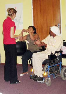 #2. The social worker visits the home. The disabled girl begs her to take her away from her cruel father. (The role of the father is played by Ebrahim, the paraplegic artist.)