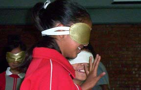 These girls enjoyed being blindfolded, but also experienced some of the challenges of blindness.