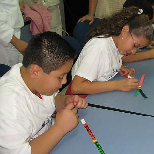 These children are making important diagnostic tools from plain paper.