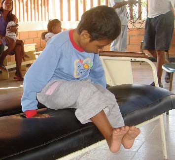 Domingo confidently shows how he can lift his weight and balance using his arms.