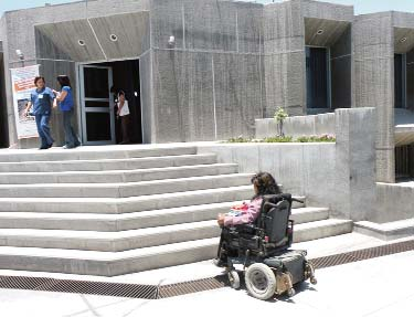 Wheelchair access remains a big problem in Peru, even in public buildings. This guest speaker in Chimbote confronted these stairs at the hospital auditorium where our disability seminar was held. Participants helped carry her up.