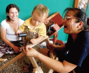 Here, in the workshop, Alejandro helps to make his own walker.