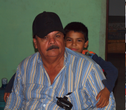 Alfredo, head of the Association of the Differently-abled People in Navolato, with Jaime. The boy has grown fond of Alfredo, who is disabled too, because the man accepts him as he is.