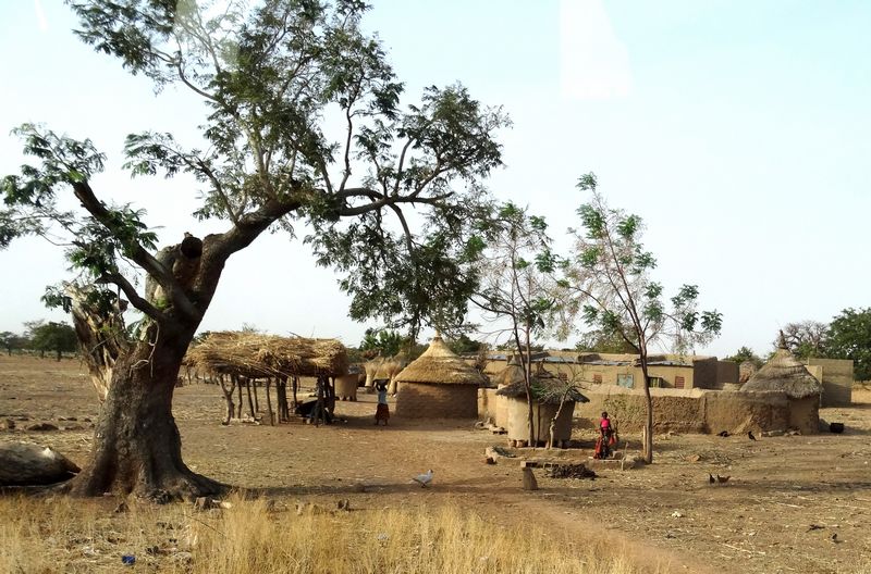 The majority of people in Burkina Faso live in the rural area, many in traditional round mud huts.
