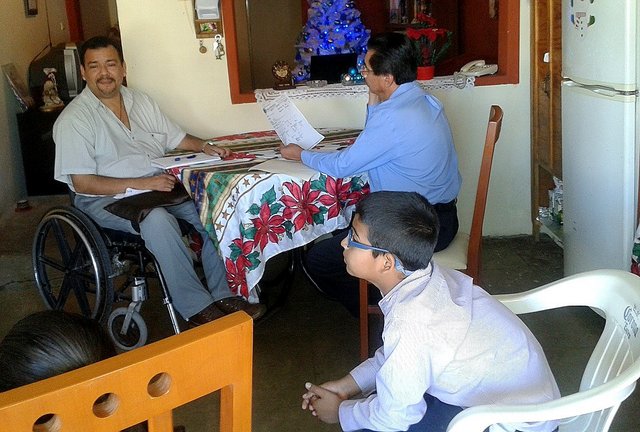 Rigo (in wheelchair) arranged for Dr. Miguel Angel to examine Ramon in Rigo's sister's house in Culiacan.