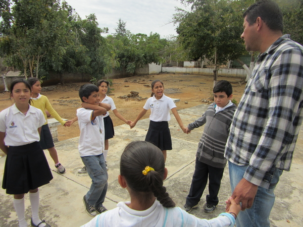 After several such races, all the children including Tonio formed a circle, holding hands.