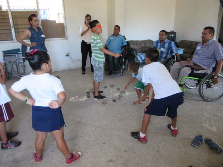 In another activity, about seeing and hearing, a blindfolded child stands in a circle of rocks. Other children, taking turns, try very quietly to sneak up and steal a rock. If the blindfolded child hears them, he or she points at them and that child is out of the game. This activity emphasizes the importance of both vision and good hearing.