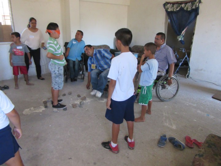 Here Tomás tries to sneak up silently in his wheelchair to steal a rock.